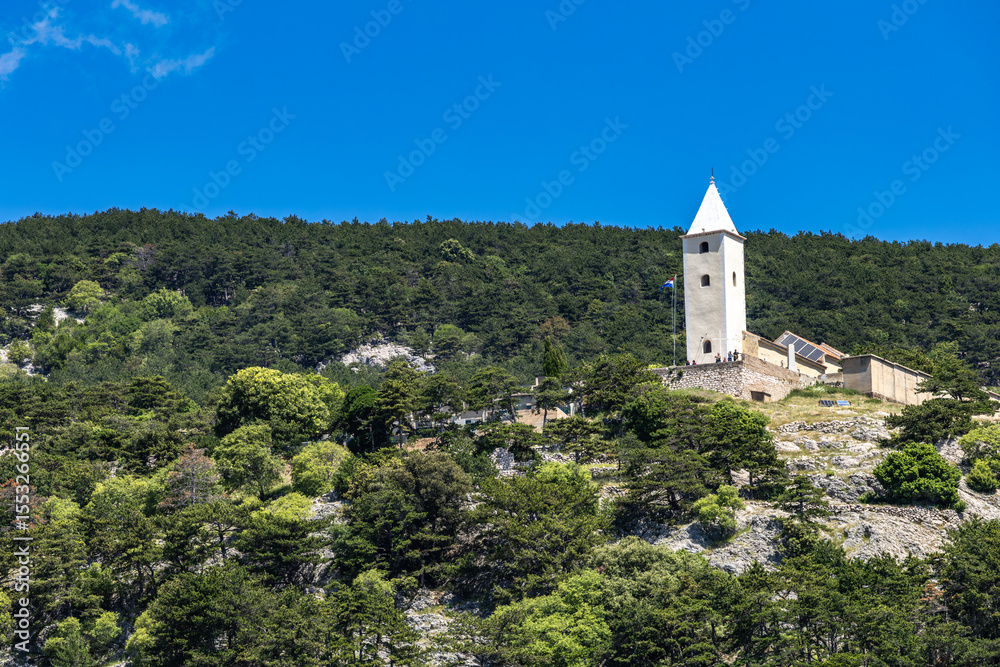 Fototapeta premium Church of St. John on a hill above the town of Baska on the island of KRK,