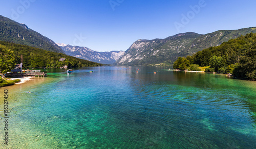 Summer at Lake Bohinj in the Julian Alps - a lake surrounded by mountains