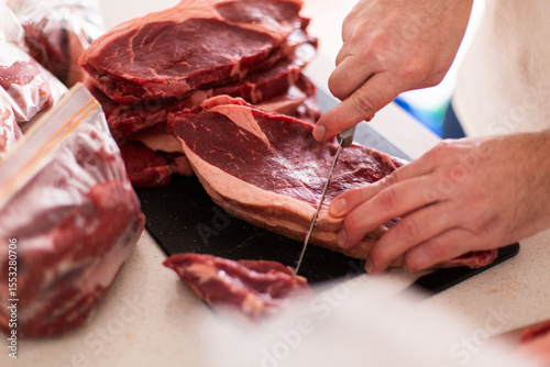 cutting up steaks into portions after a bulk meat purchase