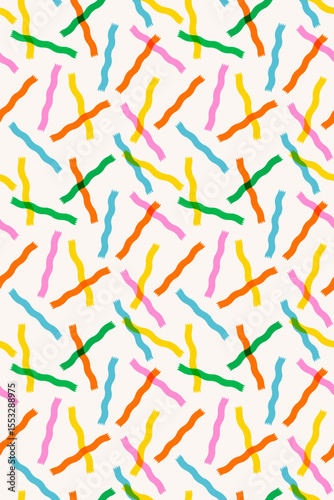 Seamless confetti pattern with colorful wavy streamers in green, yellow, pink, orange and blue on white. Seamless colorful pattern. For fabric, wallpaper, gift wrap. Drag to swatches panel to use.
