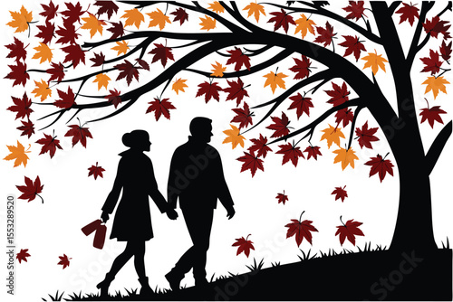 Silhouette of a couple walking together through colorful autumn leaves