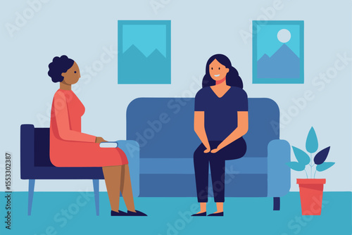 Two women sitting on a couch during a therapy session