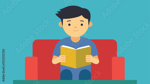 Young man relaxing on sofa reading book enjoying leisure time