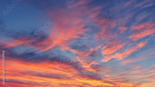 Fiery Sunset Sky Vibrant Orange and Pink Clouds Against Deep Blue Canvas Above