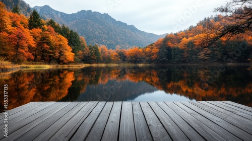 A tranquil autumn scene reflecting vibrant foliage on a calm lake, capturing the essence of fall's beauty and the serenity found in nature's changing seasons.