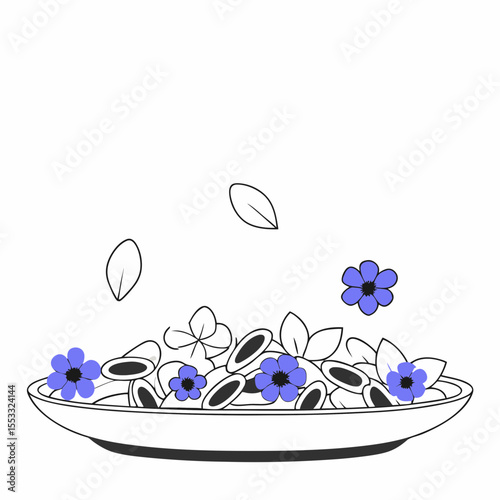 Edible flowers beautifully arranged on a plate for garnishing dishes  