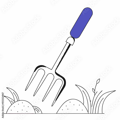 Gardening fork digging into soil with plants in background  