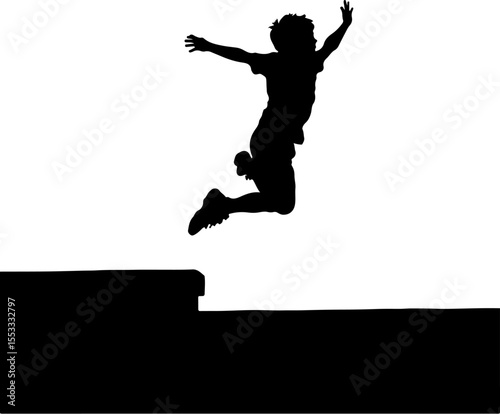 silhouette of a young man jumping