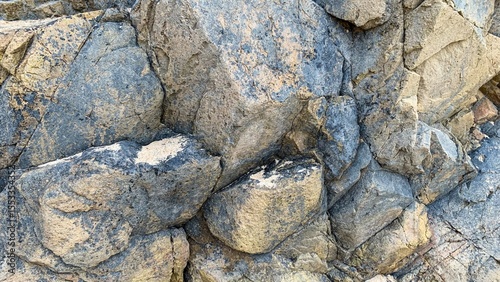 Rugged textured rocks, suggestive of ancient geological tales, embody endurance and strength, ideal for Earth Day reflections