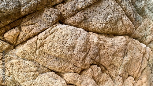 Craggy ancient stone texture resembling nature's patchwork quilt, embodying Earth's timeless geologic dance on Geologists Day