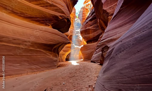 Sunlit Path Through a Narrow Sandstone Canyon