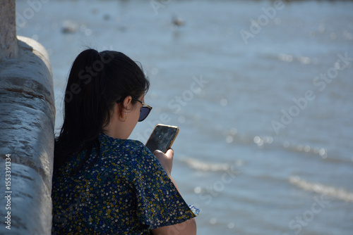 young man using cell phone