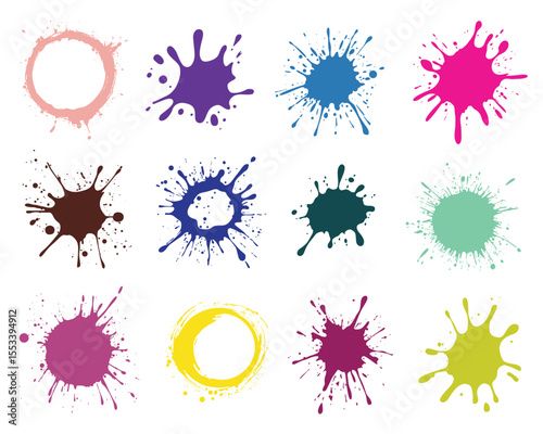 A vibrant arrangement of paint blots and ink stains displayed against a clean white backdrop, showcasing an array of hues and diverse shapes creating visual interest.