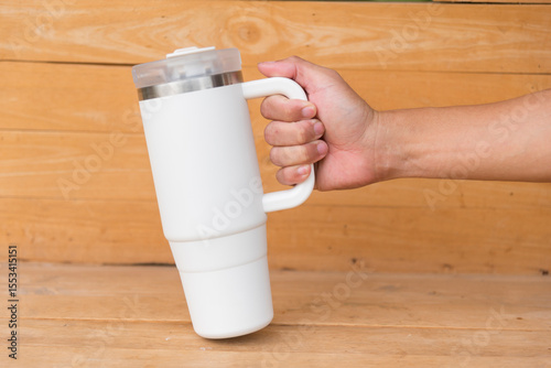 White HANDLE TUMBLER on wood table