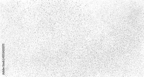 Grainy dust texture background. Abstract black and white speckle surface with grunge noise effect. Dirty film grain overlay for vintage design.
