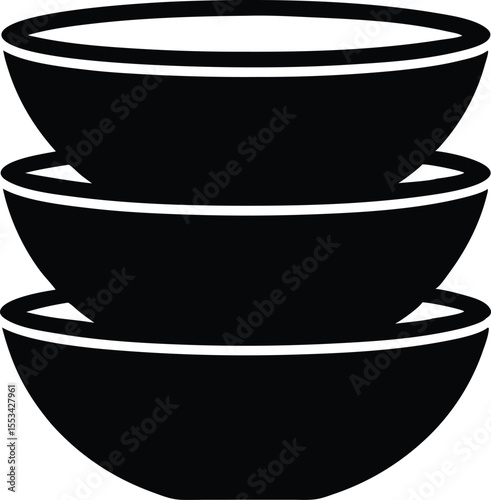 Stacked trio of black bowls forms a simple yet striking silhouette against white