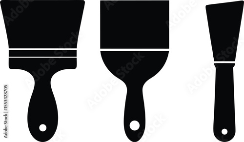 Three distinct black paint brushes are displayed against a stark white backdrop, ready for home improvement