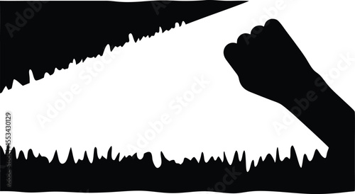 A silhouetted hand and arm holding a saw in the act of cutting something