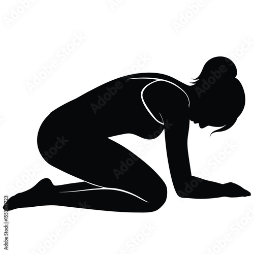 Silhouette of a Woman in Child's Pose Yoga Relaxation and Wellbeing