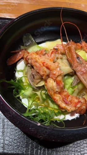Salad with shrimps in creamy sauce.