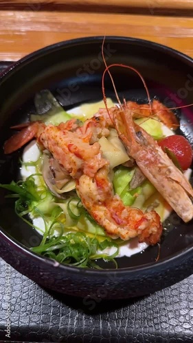Salad with shrimps in creamy sauce.
