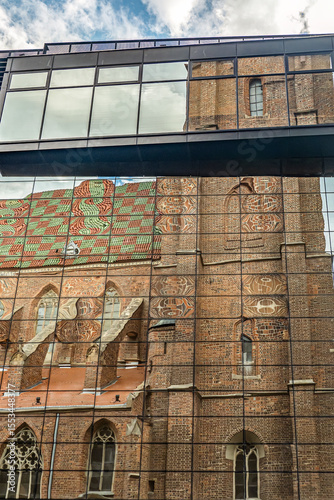 Colorful Church Facade Reflection in Glass Building Panels