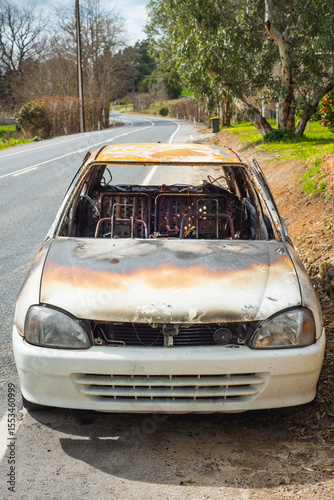burnt out stolen car abandonded on the roadside