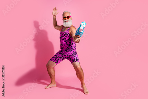 Quadro em tela Full size photo of glamour senior man have fun playing watergun wear leopard pri