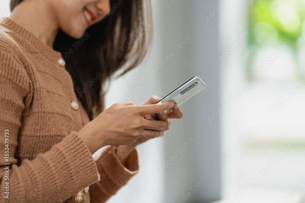 Woman using smartphone online searching on internet Woman using smartphone online searching on internet