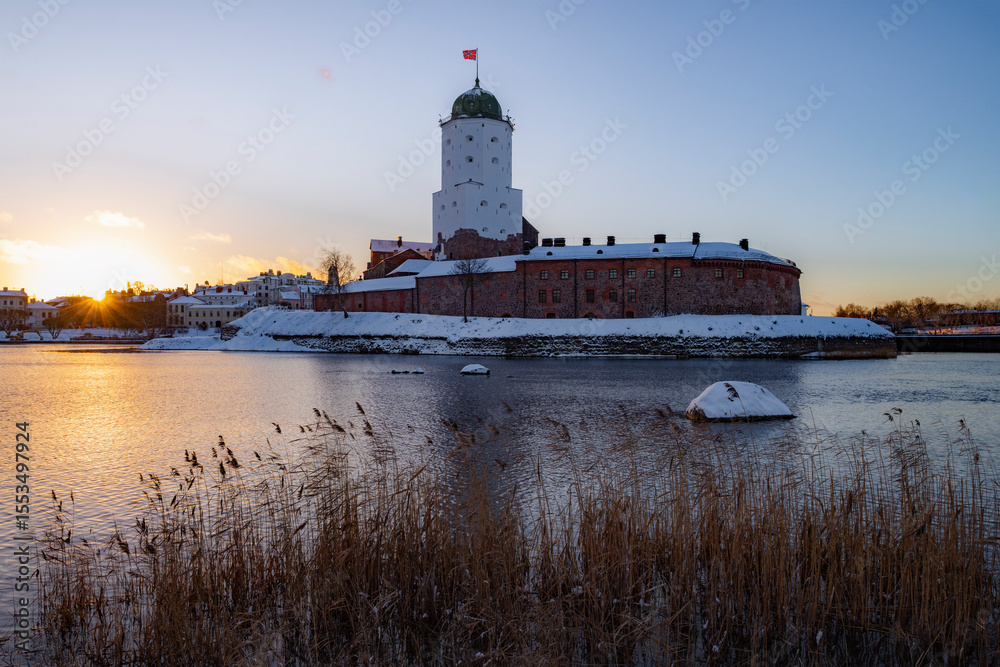 Medieval Vyborg Castle in the morning November landscape. Vyborg, Leningrad Oblast. Russia Medieval Vyborg Castle in the morning November landscape. Vyborg, Leningrad Oblast. Russia