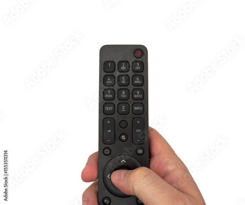 White male hand on white background presses buttons on TV remote control, man switches TV channels with remote control, for banners, for TV advertising. Copy space, flay lay, top view. High quality ph