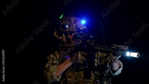 special forces soldiers conduct a night raid using night vision goggles a tactical light and a laser sight A concept for modern warfare and covert operations
