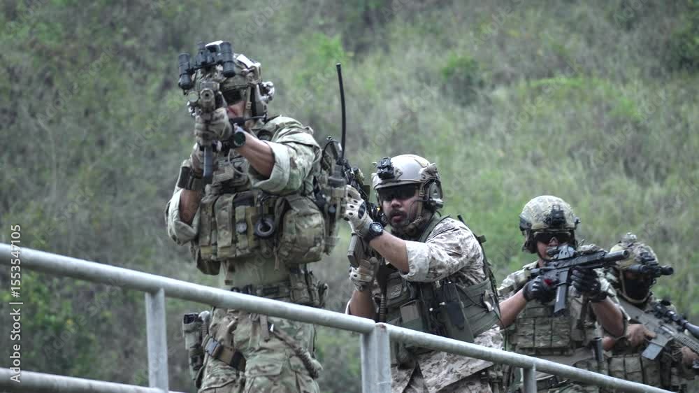 An elite special forces squad advances in a tactical formation across a bridge during a jungle warfare mission A concept of teamwork and military power An elite special forces squad advances in a tactical formation across a bridge during a jungle warfare mission A concept of teamwork and military power