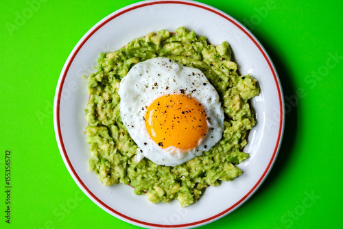 Healthy Fried Egg On Mashed Avocado Meal