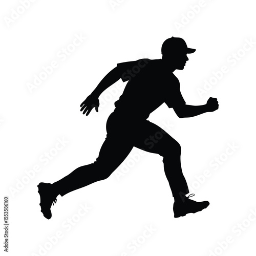 Silhouette of a baseball player running towards first base with determination