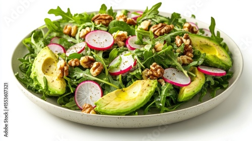Avocado Radish Salad with Walnuts: A vibrant and healthy salad featuring fresh avocado slices, crisp radish rounds, peppery arugula, and crunchy walnuts, arranged on an elegant plate. 
