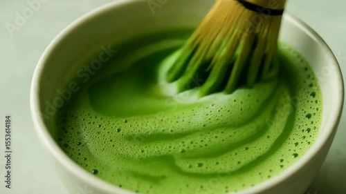 Crafting a perfect cup of matcha tea using traditional whisking techniques