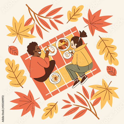 Two people enjoying a picnic on a blanket surrounded by colorful autumn leaves in a square composition