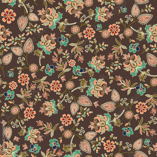 a brown and green floral pattern on a dark background