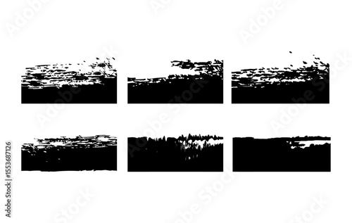 A set of black brush stroke banners with rough, distressed textures. Blending vintage grunge aesthetics with modern design, these rectangular ink smudges and frames.