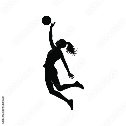 Silhouette of a female volleyball player making a powerful jump serve athletic action pose