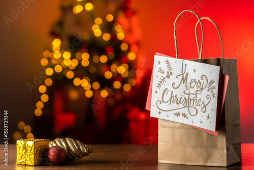 Holiday Shopping Bag with Christmas Card and Red Glow Background