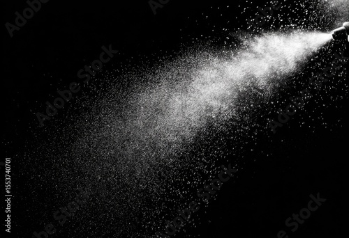 Spraying water on a black background