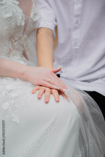 bride and groom holding hands