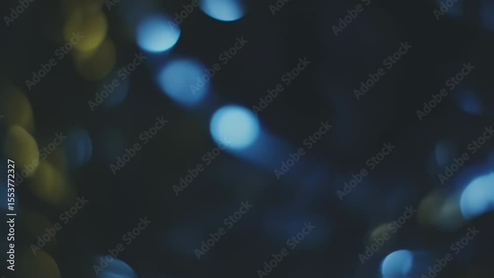 Abstract blue and yellow bokeh background for festive celebration event