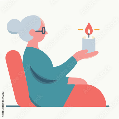Elderly woman sitting and holding a candle while relaxing at home  