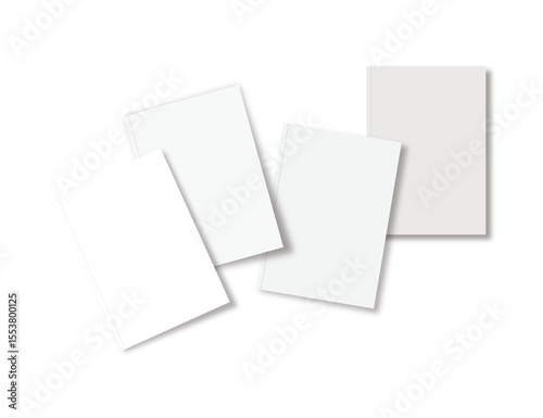 Minimalist top view of four blank books arranged on gray background, perfect for mockups, publishing, and editorial design concepts.