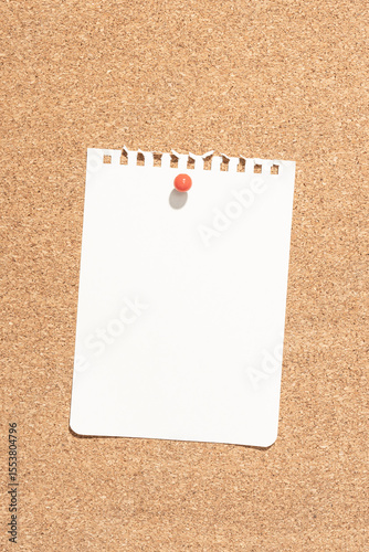 Blank notebook paper sheet pinned on cork board. Template Mock up