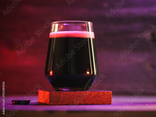 Imperial stout beer glass on podium