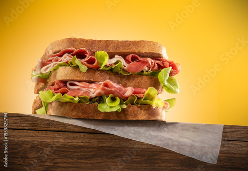 Spain ham sandwich on wooden board